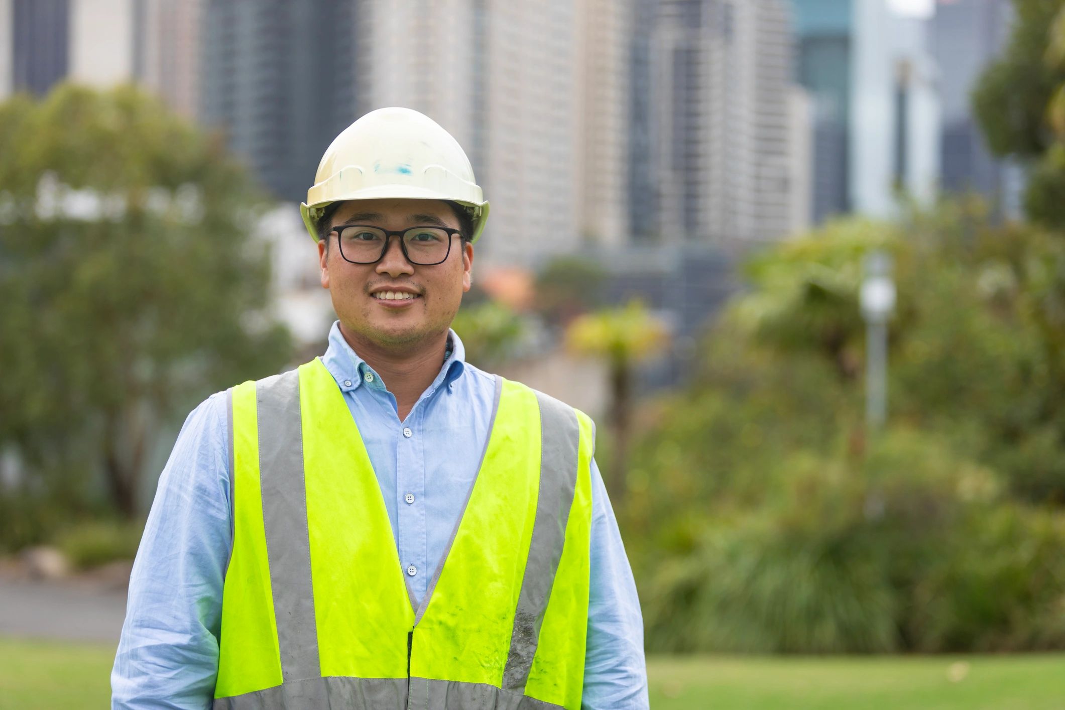 Portrait of an engineering professional in a hard hat and high-visibility vest