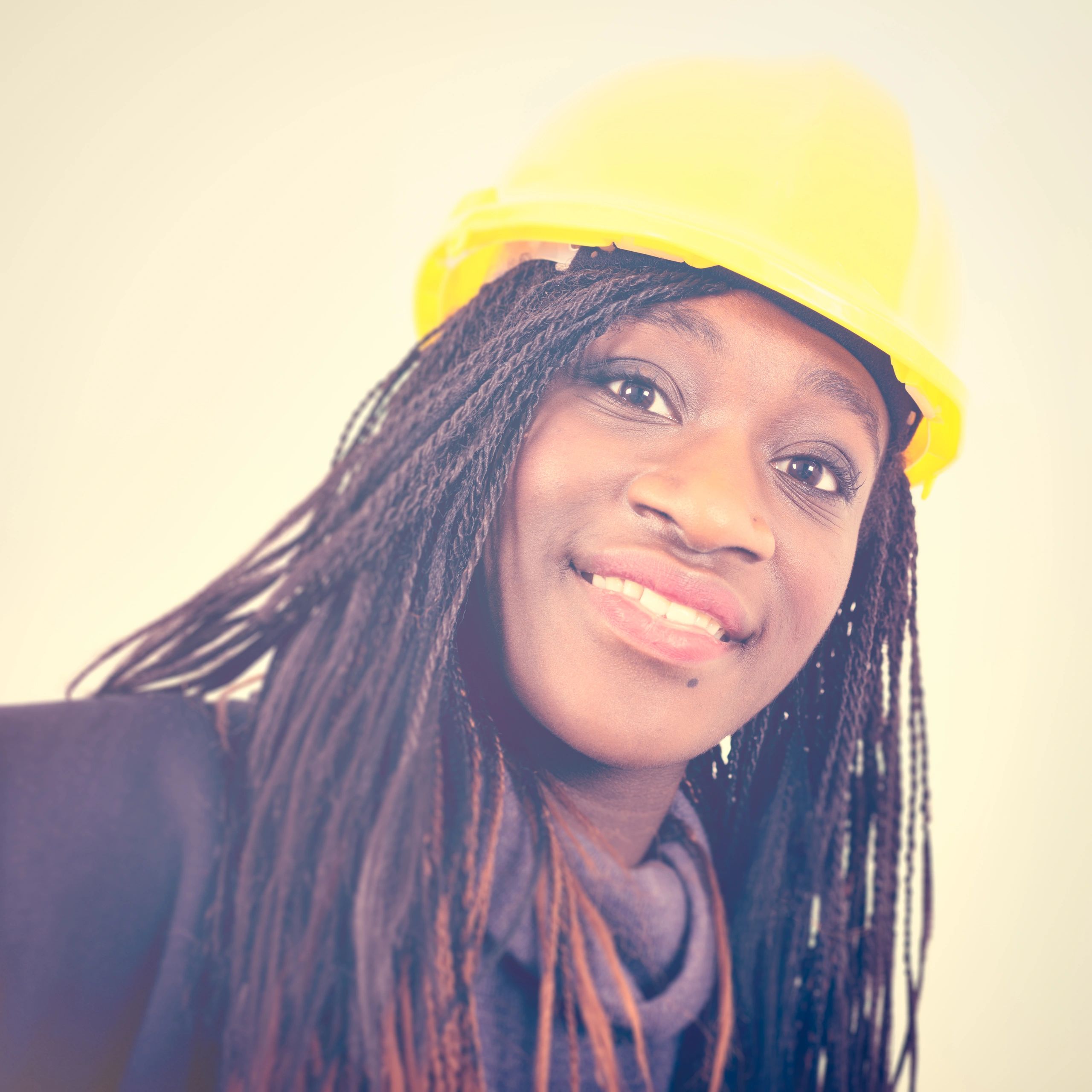 Professional headshot of a construction professional wearing a hard hat